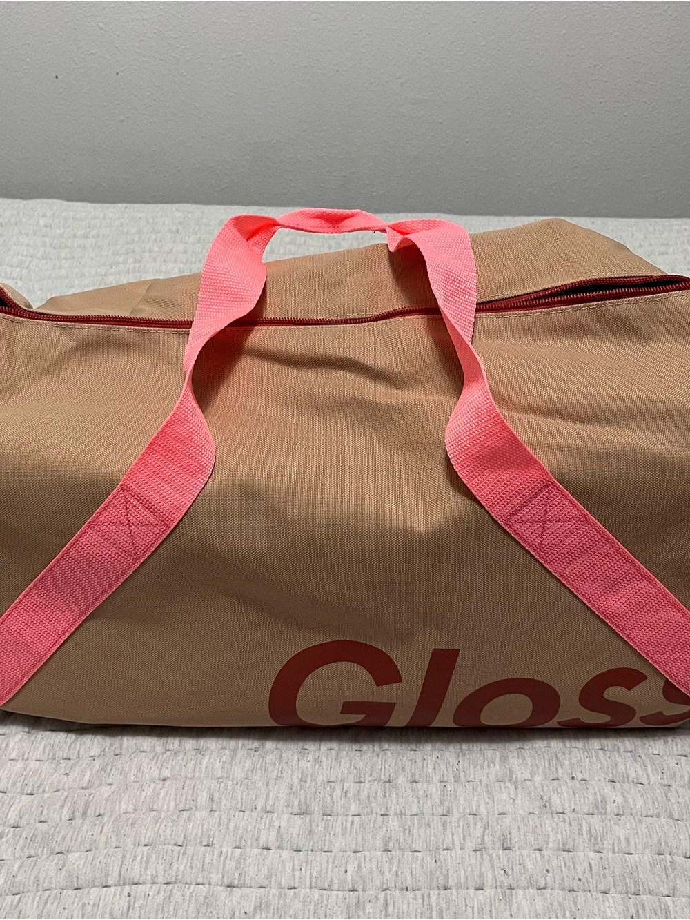 Glossier Tan Duffel with Bright Pink Straps